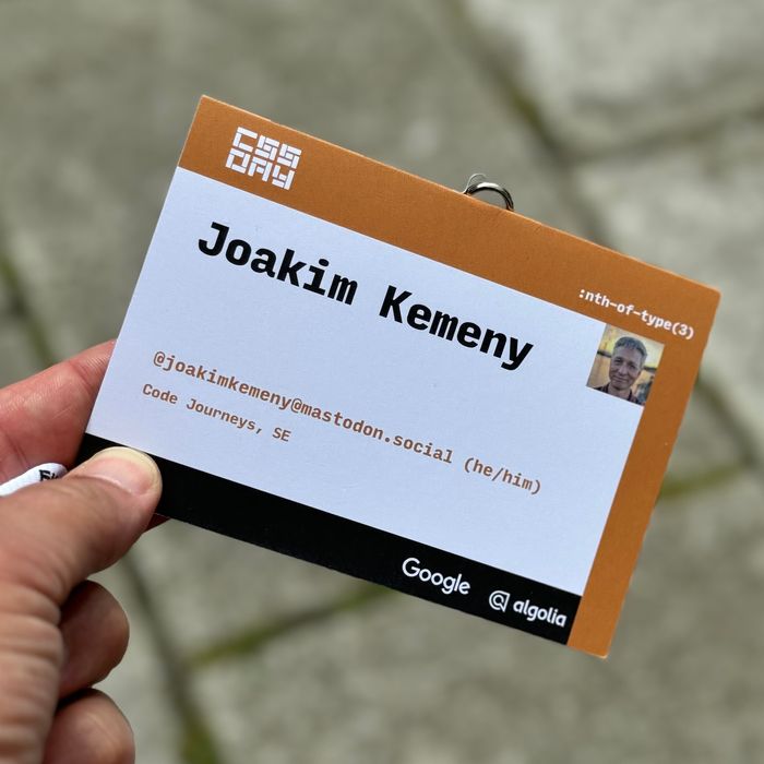 My attendee badge for CSS Day